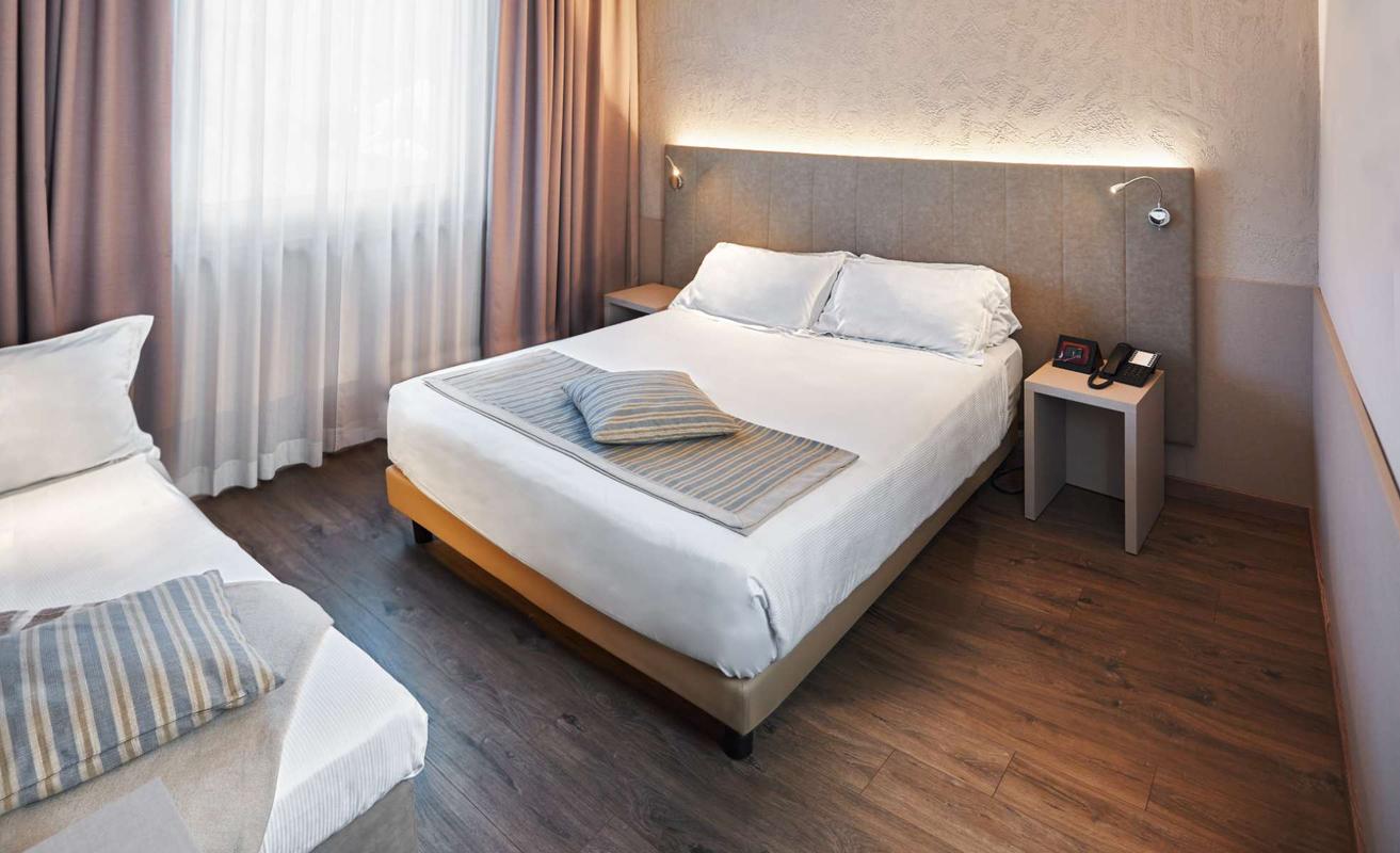 Standard Triple Room  First Hotel Malpensa Somma Lombardo Standard Triple Room  First Hotel Malpensa Somma Lombardo